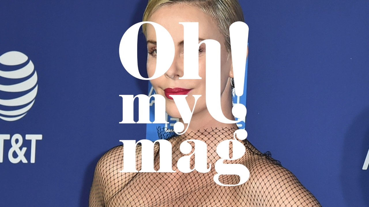 Charlize Theron Completely Changed With A Bold Look With Her Platinum Pixie Cut And Fishnet Dress