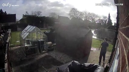 Wind Blows Shed Door Hitting Husband on the Head