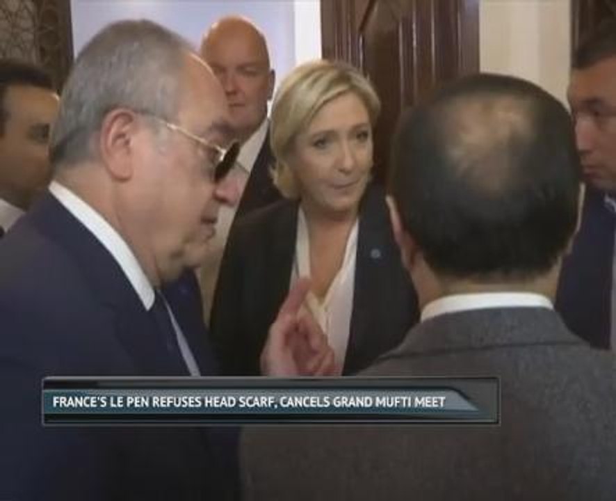 France's Le Pen refuses head scarf, cancels Grand Mufti meet