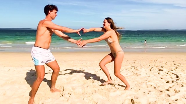 'Aussie girl pulls off a picture-perfect backflip off her brother's shoulders '
