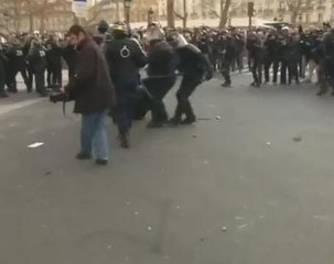Police, protesters clash in Paris
