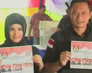 Candidates of Jakarta election and Indonesian President cast their votes