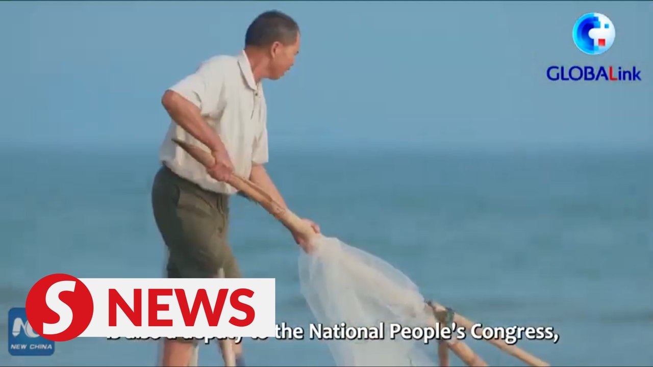 Chinese lawmaker of Jing ethnic group helps revive local fishing industry