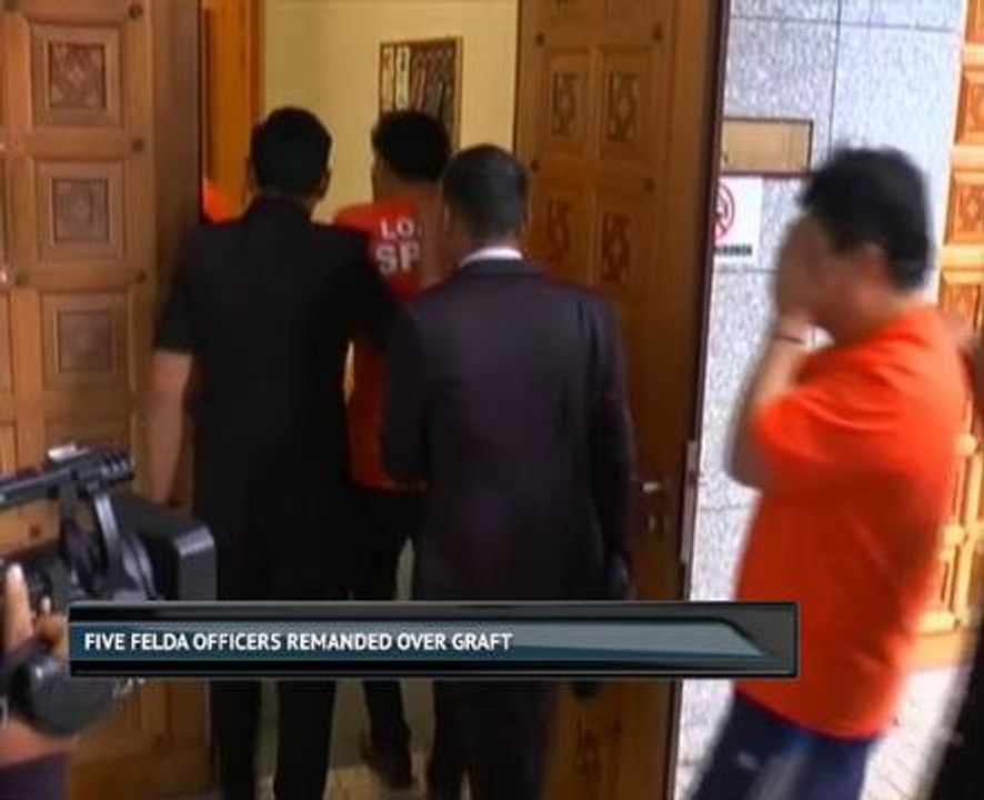 Five Felda officers remanded over graft