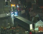 German police remove truck from site where 12 people were killed, 48 injured