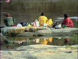 Maldhari women doing manual laundry on river side