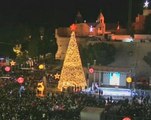 Palestinians light up Christmas tree in Bethlehem