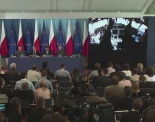 Families divided as Poland exhumes victims of 2010 crash