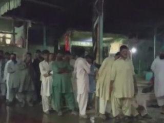 More than 50 dead in Pakistan shrine attack, families search for loved ones