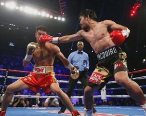Pacquiao beats Vargas to take WBO welterweight crown