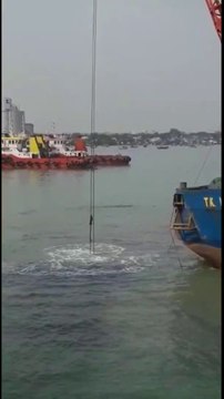The process of dredging mud on the high seas