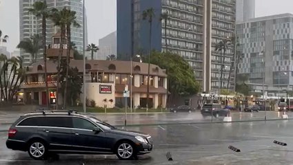 Storm strikes the Southwest with rain and mountain snow