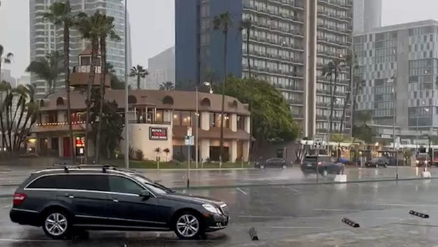 Storm strikes the Southwest with rain and mountain snow