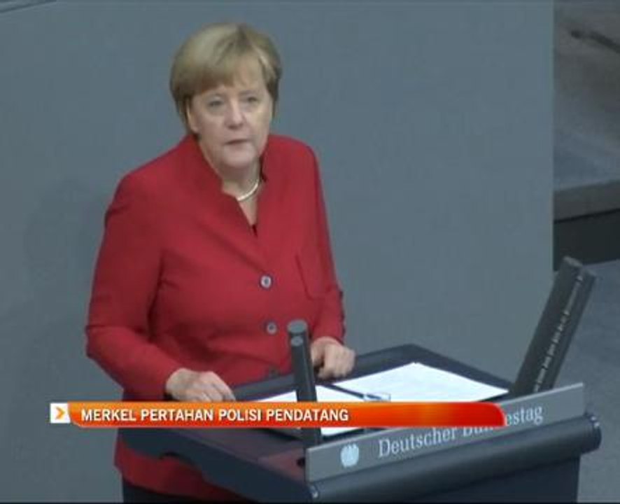 Angela Merkel Merkel pertahan polisi pendatang