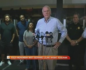 Polis menembak mati seorang lelaki akibat rusuhan