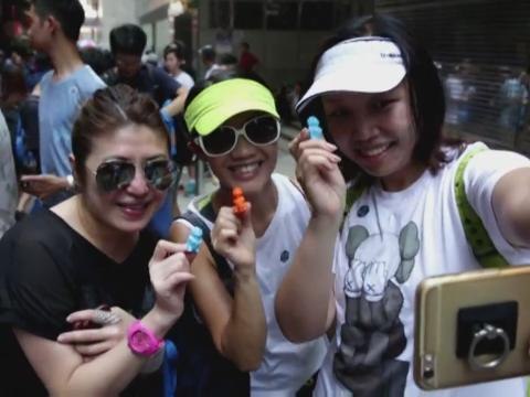 Hundreds hit streets in Hong Kong's first 'PokeWalk'