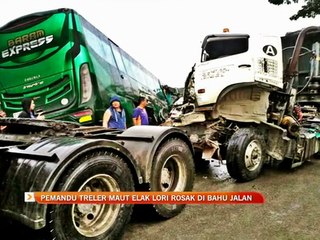 Pemandu treler maut elak lori rosak di bahu jalan