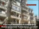Syrian media shows families leaving besieged Aleppo