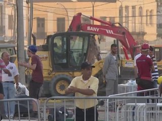 Olympics chief brushes off athletes' village worries