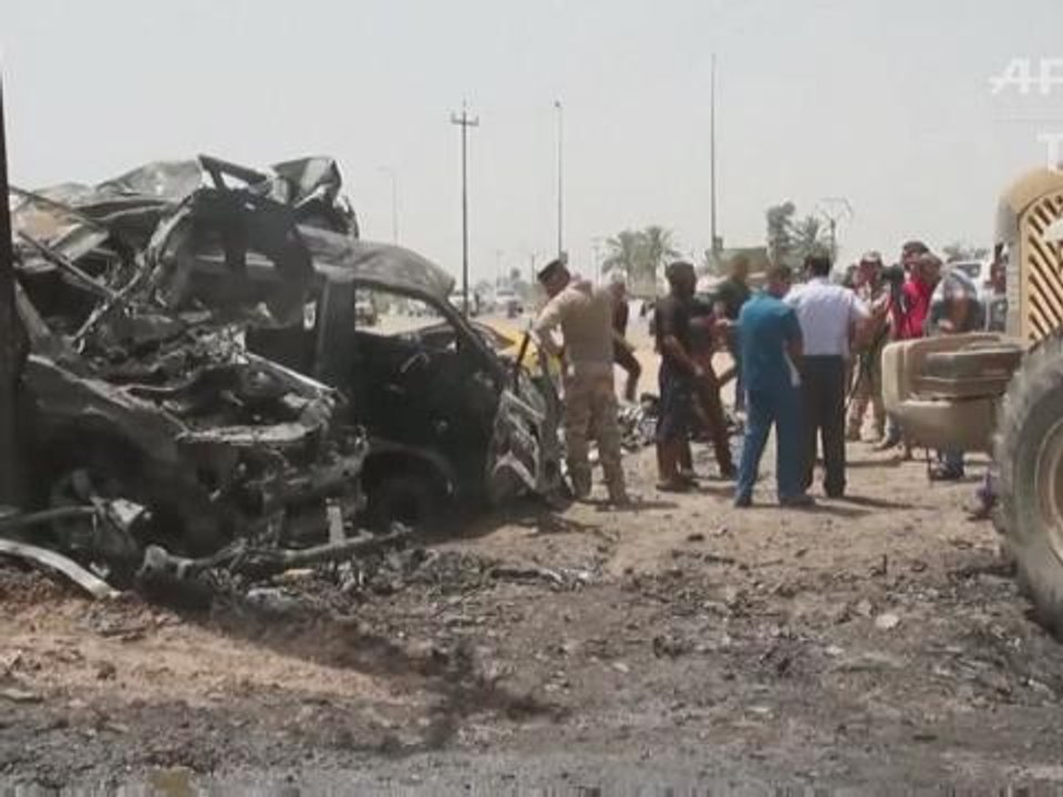 Suicide bomber kills 12 at checkpoint north of Baghdad