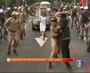 Ditangkap ketika cuba merebut obor Olimpik