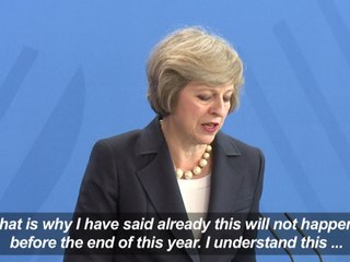 Merkel accepts Britain's decision to delay triggering Brexit