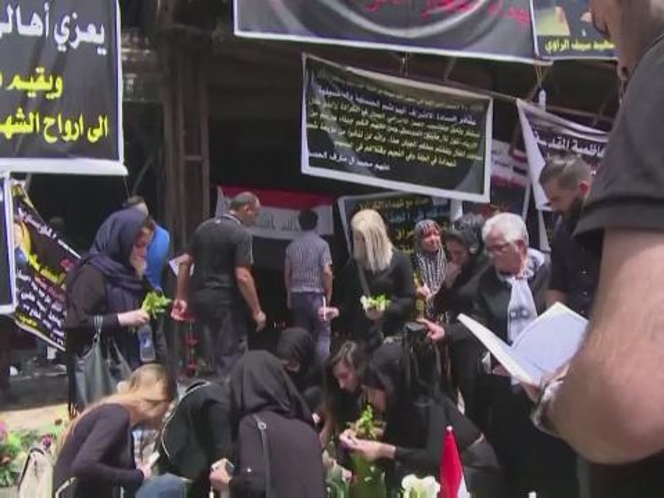 Baghdad residents pay tribute to attack victims on Eid al-Fitr