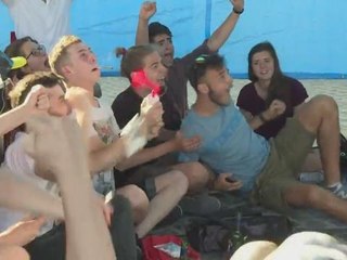 Italian football fans in Rome cheer on Italy goal