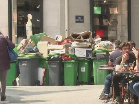 Rubbish piles up in Paris as labour strikes continue