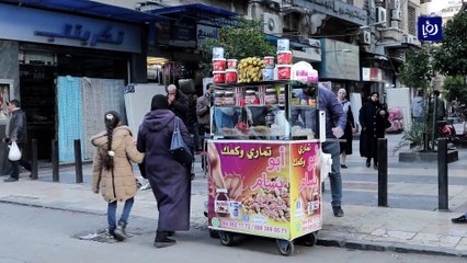 عربات وأكشاك تقدم المأكولات الشعبية الشتوية في دمشق