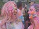 Hundreds covered in bright colors in New York to celebrate Holi
