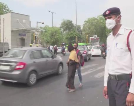 India's smog-choked capital imposes driving restrictions