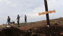 Ukrayna'da ölen siviller toplu mezarlara gömülmeye başlandı