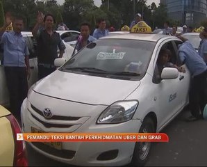Pemandu teksi bantah penggunaan Uber dan Grab
