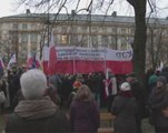 Poles rally against the government in court reform battle