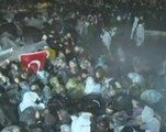 Anti-Erdogan newspaper defiant, police disperse protesters