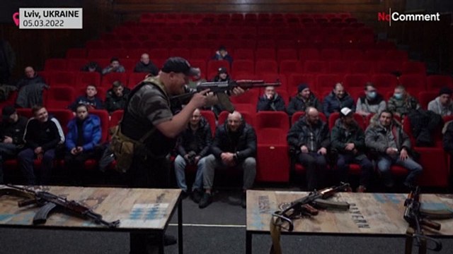 Ukraine invasion: civilians attend weapons training in Lviv's former Film Centre