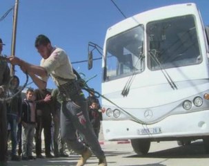 Pulling buses with his teeth, the Jason Statham of Gaza