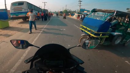 Motorcycle And Rickshaw Collide On Busy Bangladesh Road