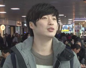 South Koreans react to North's rocket launch