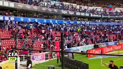 Así se vivió la riña entre aficionados en el Estadio Corregidora