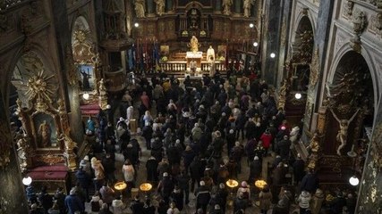 Amid Russian attacks, Ukrainians seek shelter in church