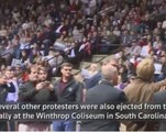 Woman in Muslim headscarf ejected from Trump rally