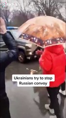 Ukrainians try to stop Russian convoy