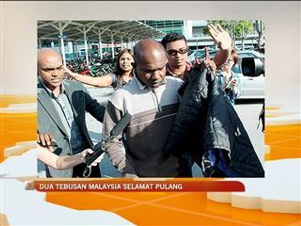 Dua tebusan Malaysia selamat pulang