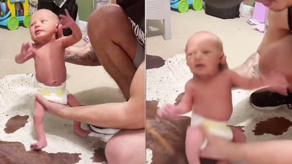'Dad helps NEWBORN son learn how to dance *Try Not to Laugh*'