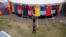 'Fearless circus duo puts on a hand-to-hand acrobatics act while STANDING on someone's SHOULDERS! '