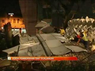 Kerja pembersihan sisa runtuhan giat dilakukan