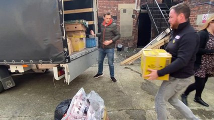 Father and son Graham and Kevin Hogg get ready to drive a truck filled with donations to the people of Ukraine