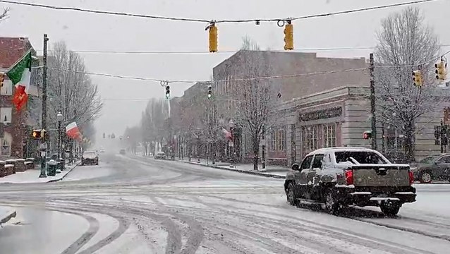 Just after spring warmth, storm dumps snow throughout the Northeast